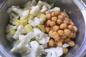 Cook the carrots potatoes cauliflowers and chickpeas