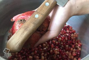 tap on the back of the pomegranates