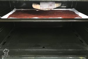 Plum puree in the oven tray